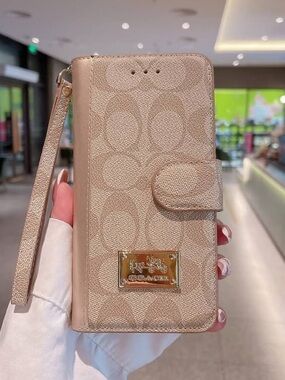 Beige Coach Apple iPhone 13 Phone Case w/Gold Coach Logo Detail & Wristlet Strap